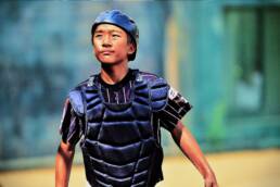 sports advertising photographer - Japanese youth baseball catcher