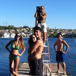 Randy Schwartz - Commercial Lifestyle Photographer on ladder at Lake Mission Viejo